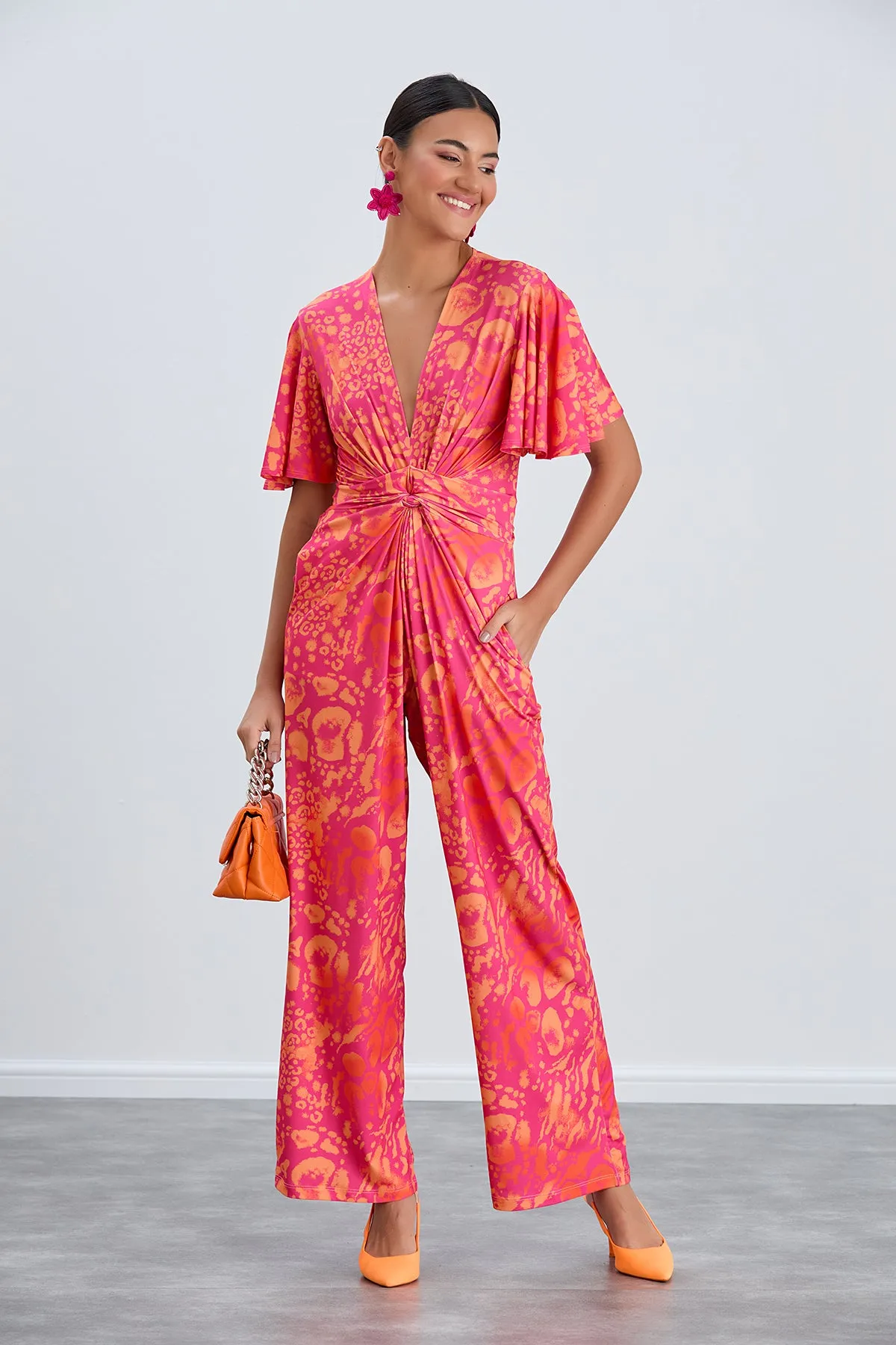 Angel Sleeve Twist Maxi Jumpsuit in Tropical Fuchsia print
